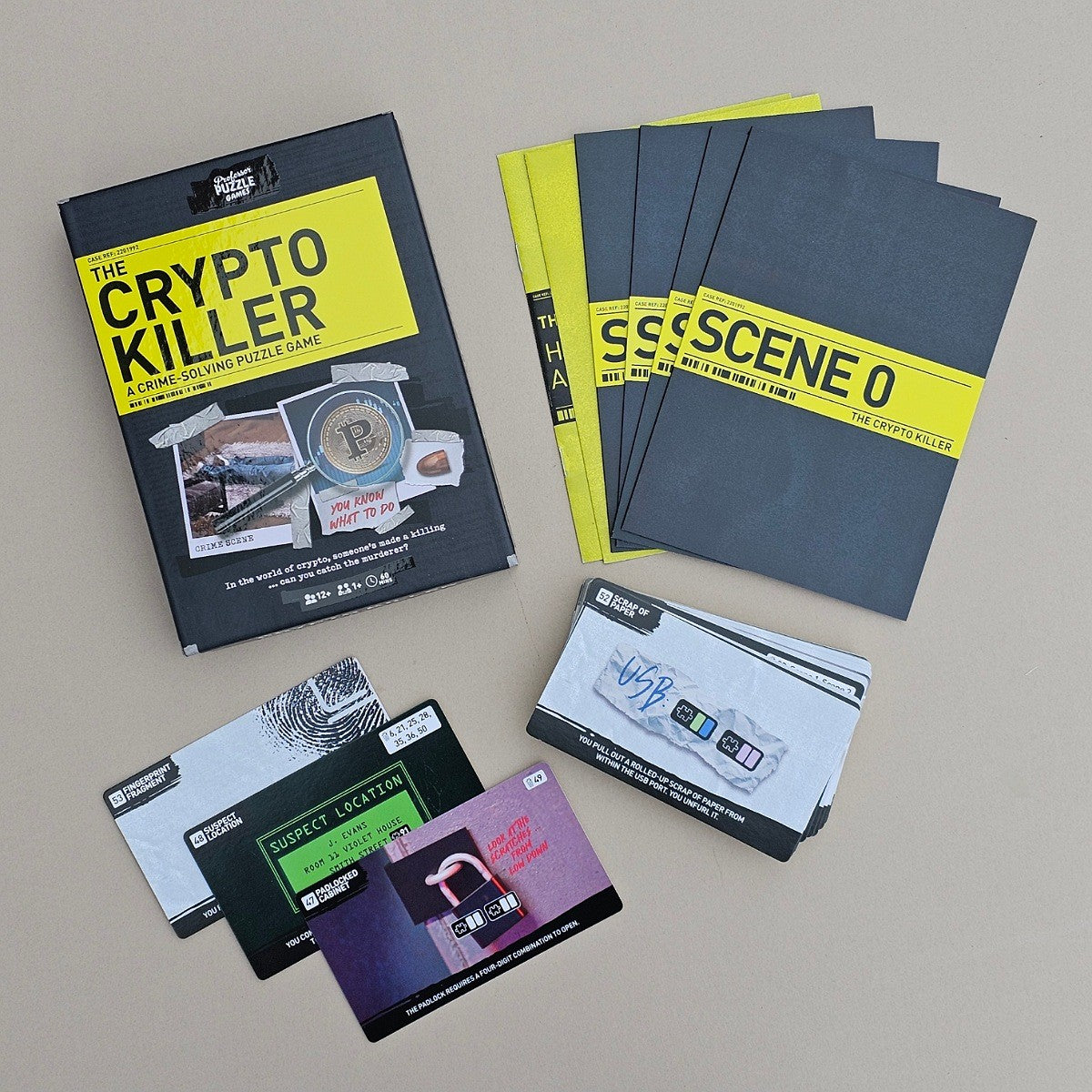Puzzle game packaging with 'The Crypto Killer' book and cards on a neutral background